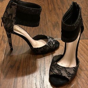 Vince Camino black lace high heels.